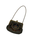 Antique Late 1800’s, early 1900’s Embroidered withy seed pearls, brass filigree corners and clasp.