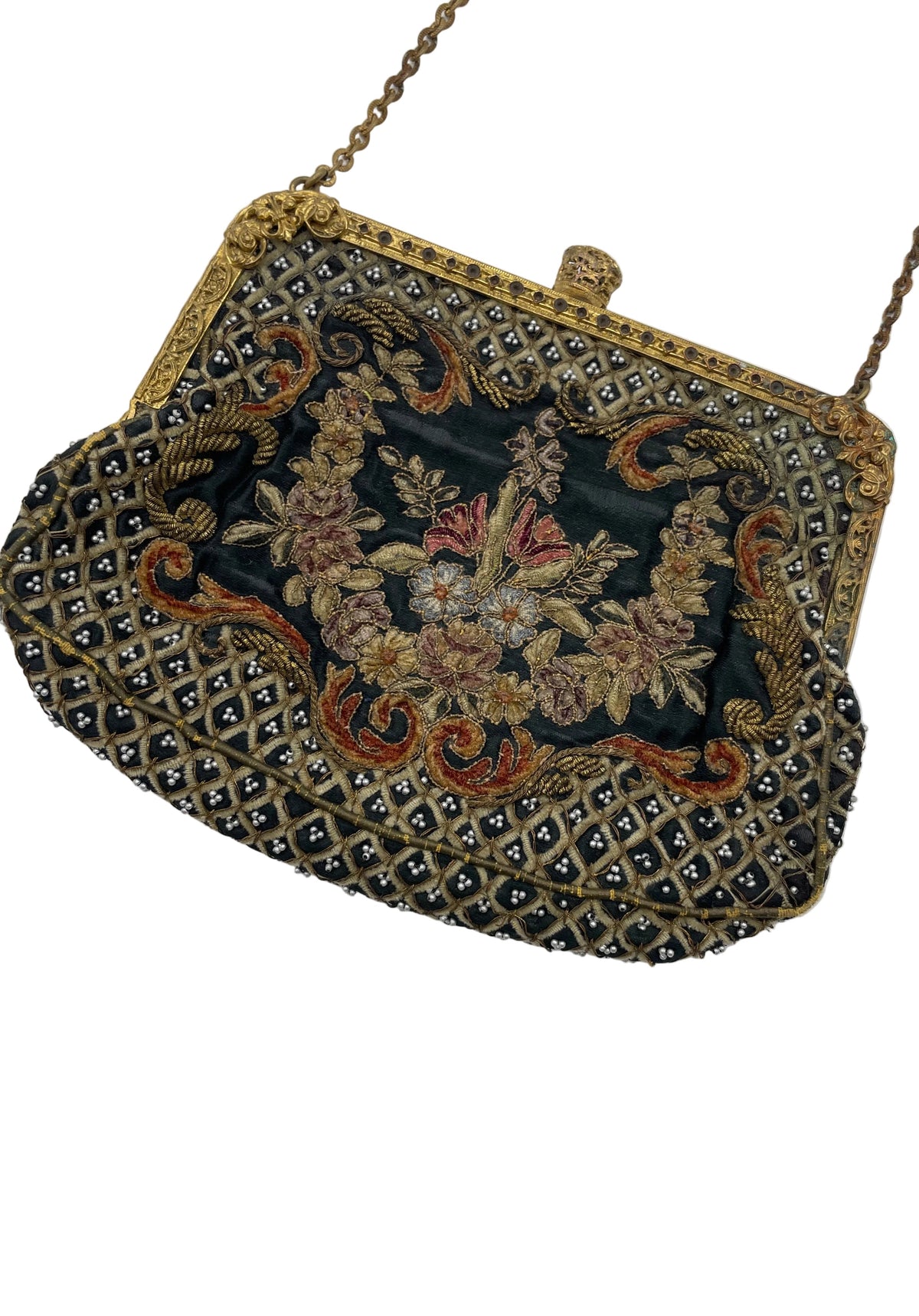 Antique Late 1800’s, early 1900’s Embroidered withy seed pearls, brass filigree corners and clasp.