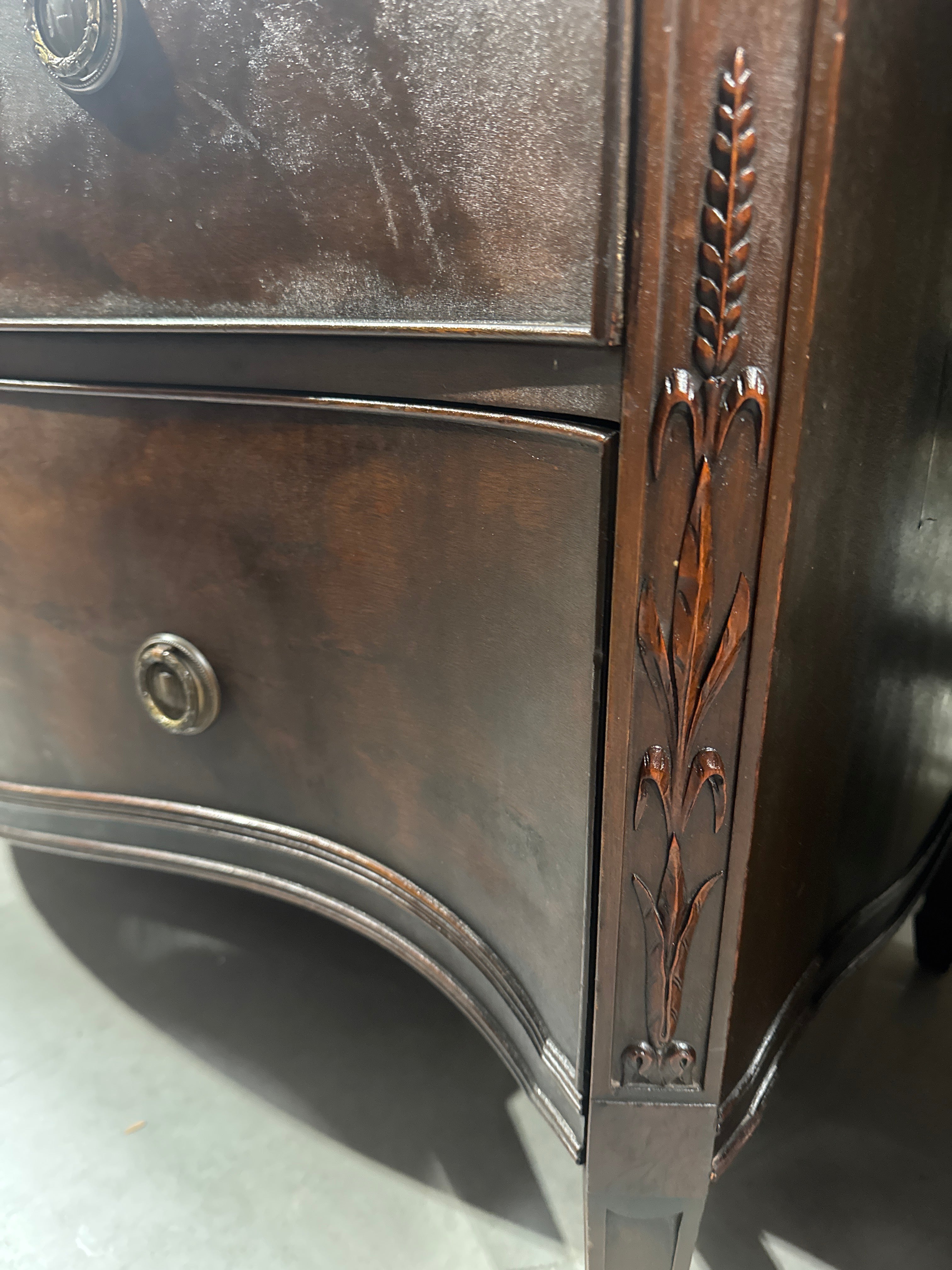 Vintage Baroque-Style Chest of Drawers featuring Ornate Wood Carvings and Brass Pulls.