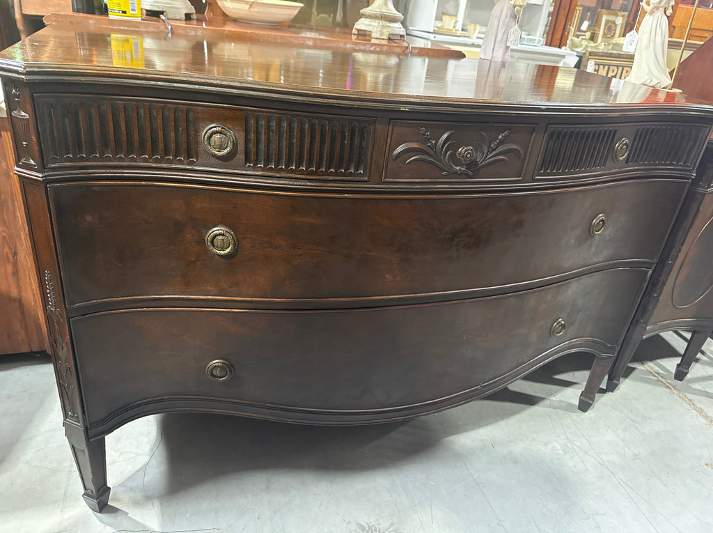 Vintage Baroque-Style Chest of Drawers featuring Ornate Wood Carvings and Brass Pulls.