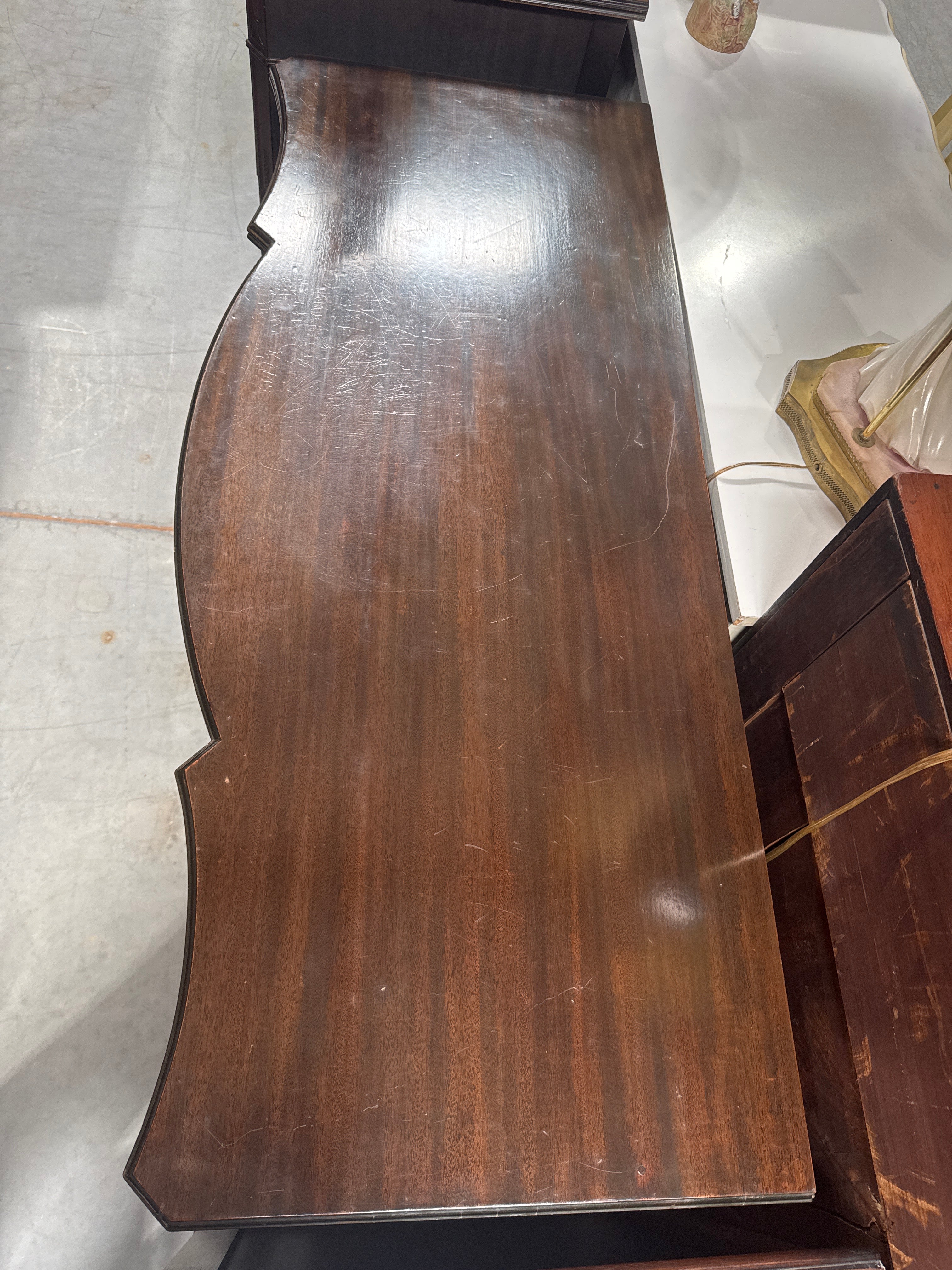 Vintage Mahogany Serpentine Front Vanity or Desk with Elegant Inlaid Detailing
