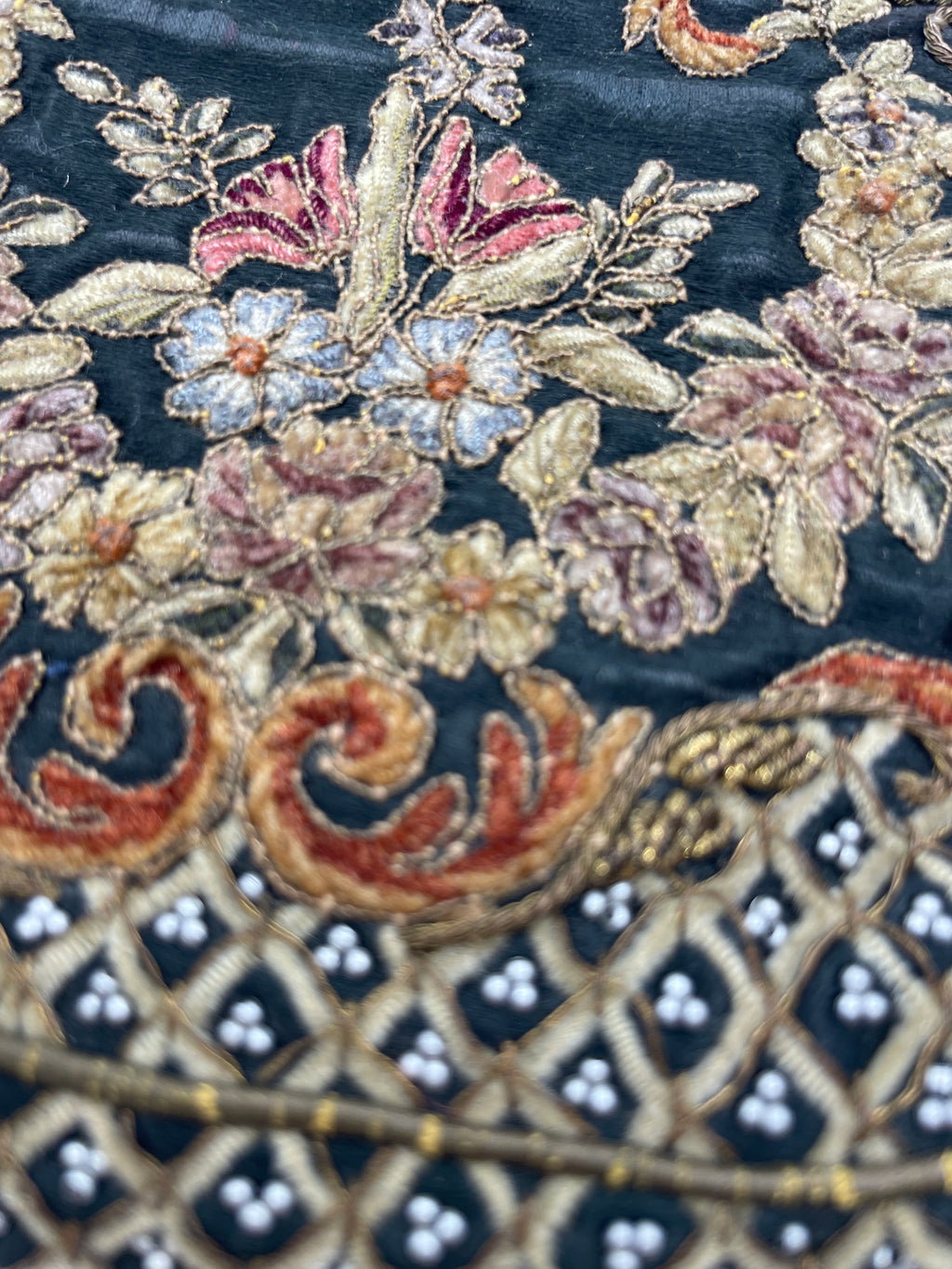 Antique Late 1800’s, early 1900’s Embroidered withy seed pearls, brass filigree corners and clasp.