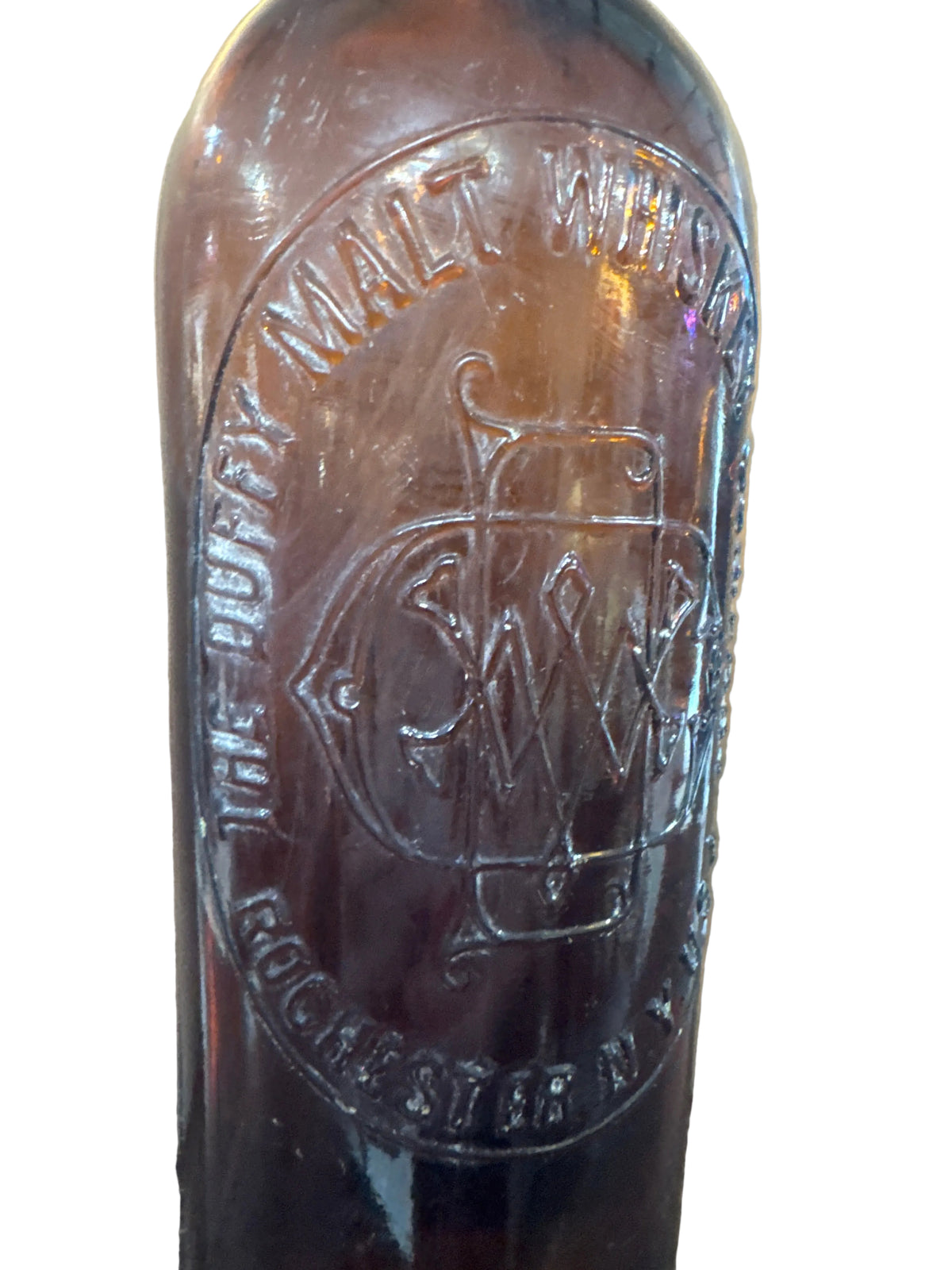 Antique Amber Glass Bottle from The Duffy Malt Whiskey Company of Rochester, NY, featuring an Embossed Patent Date of August 24, 1886