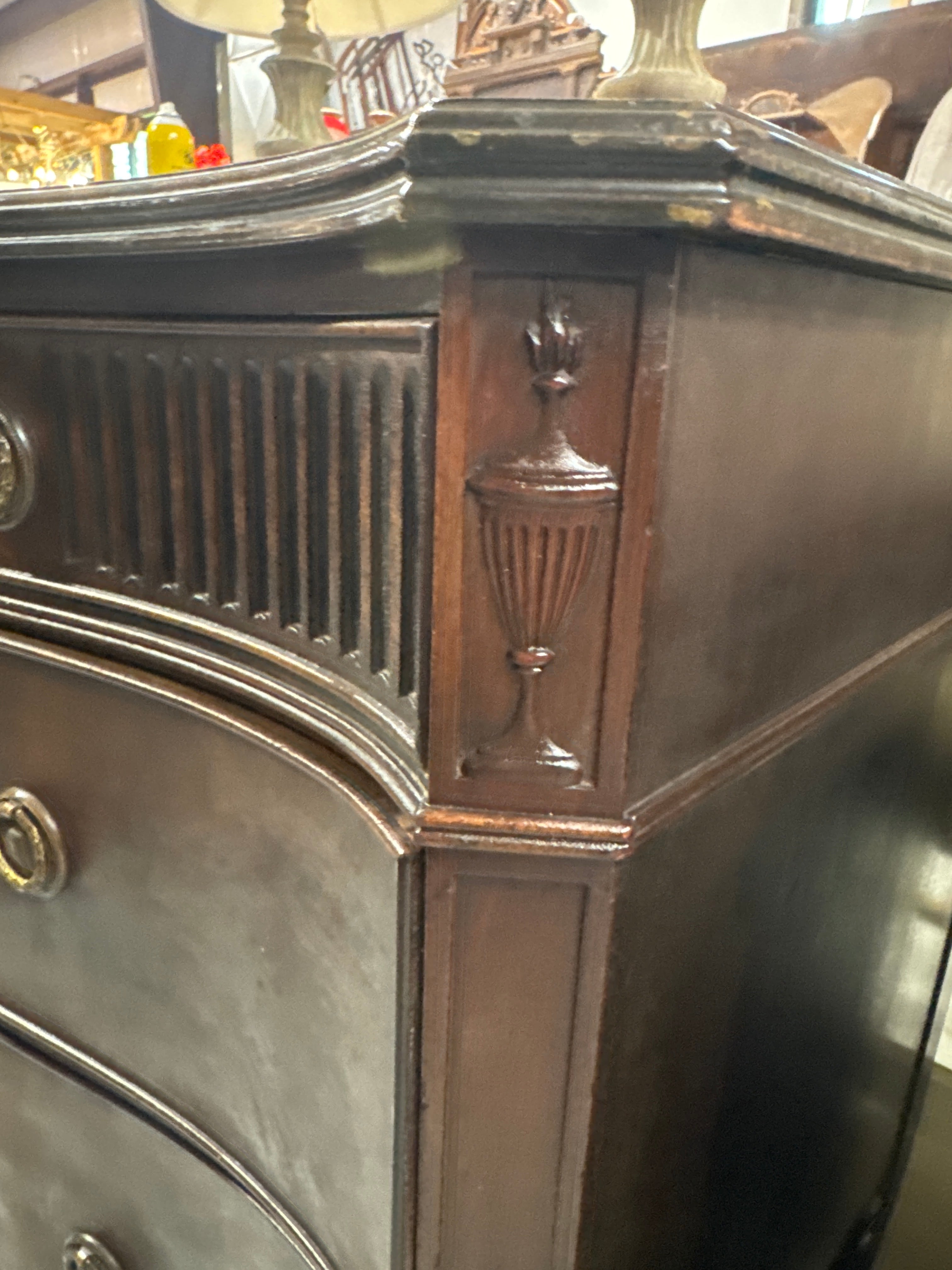 Vintage Baroque-Style Chest of Drawers featuring Ornate Wood Carvings and Brass Pulls.