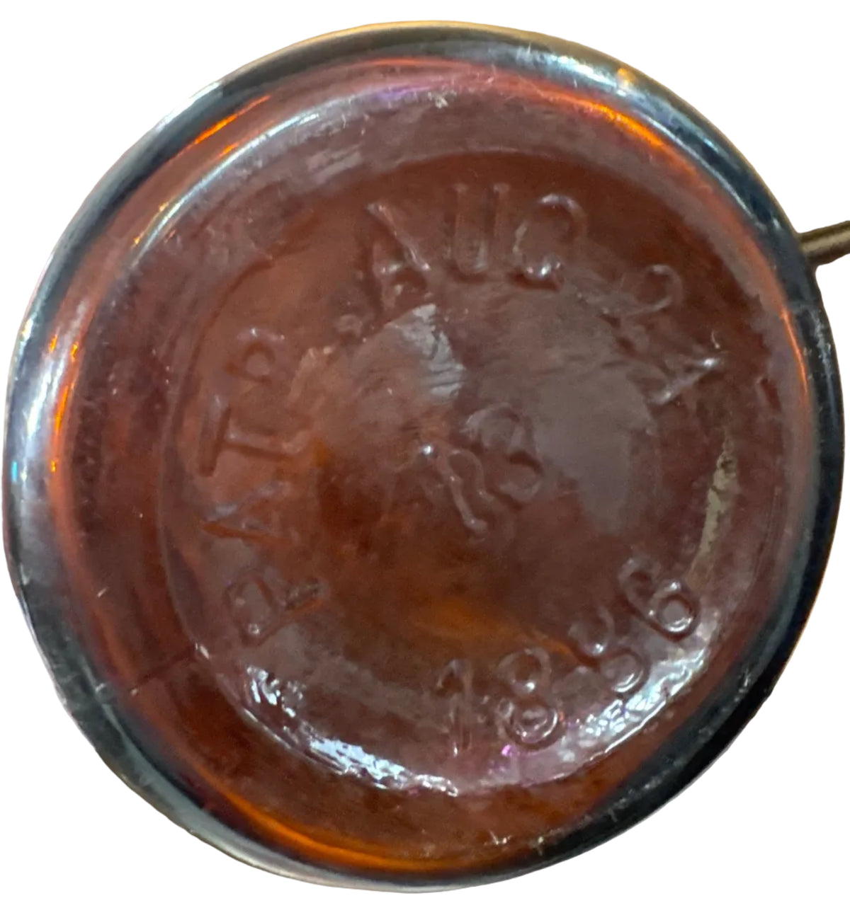 Antique Amber Glass Bottle from The Duffy Malt Whiskey Company of Rochester, NY, featuring an Embossed Patent Date of August 24, 1886