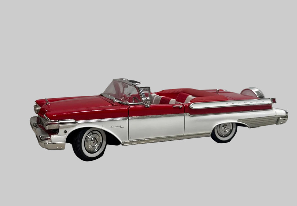 Model of a classic car on a metallic surface