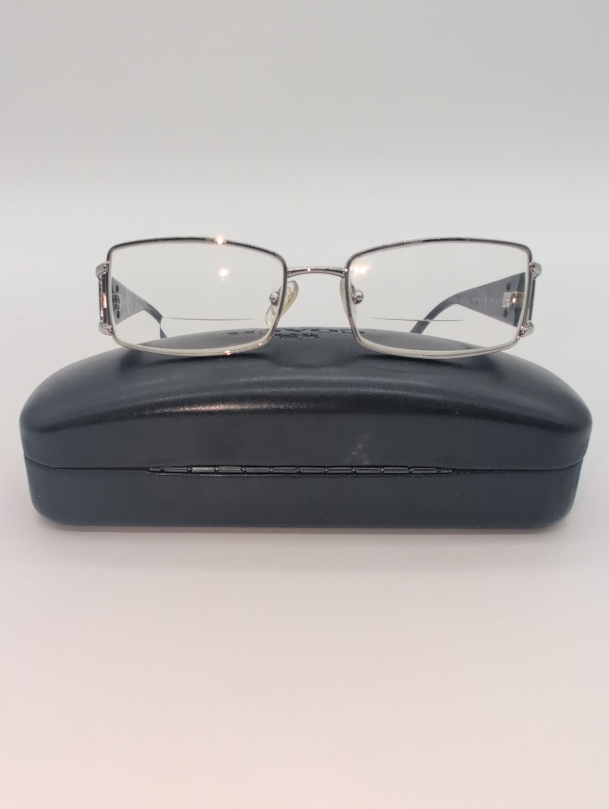 Vintage Versace, Model VE1163M, Silver Metal Frames Featuring Black Temple Arm with Iconic Silver Medusa Logo. Bifocal lenses with Unknown Prescription.
