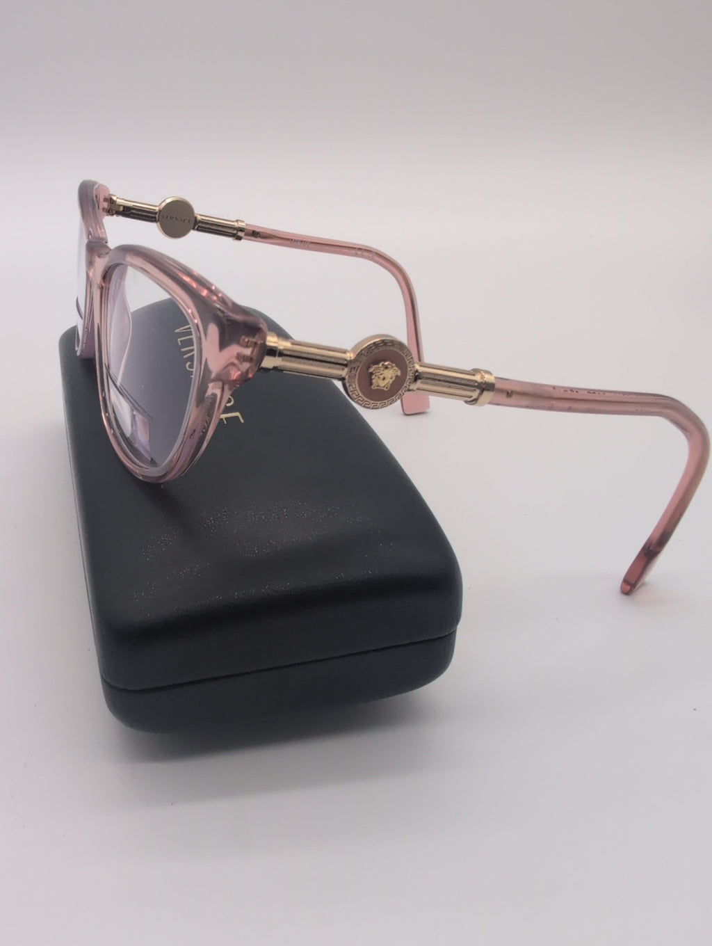 Versace, Model VE3311, Cat Eye Reading Glasses in Transparent Pink with Gold Accented Temples. Bifocal Lenses with Unknown Prescription.