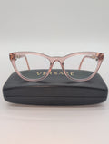 Versace, Model VE3311, Cat Eye Reading Glasses in Transparent Pink with Gold Accented Temples. Bifocal Lenses with Unknown Prescription.