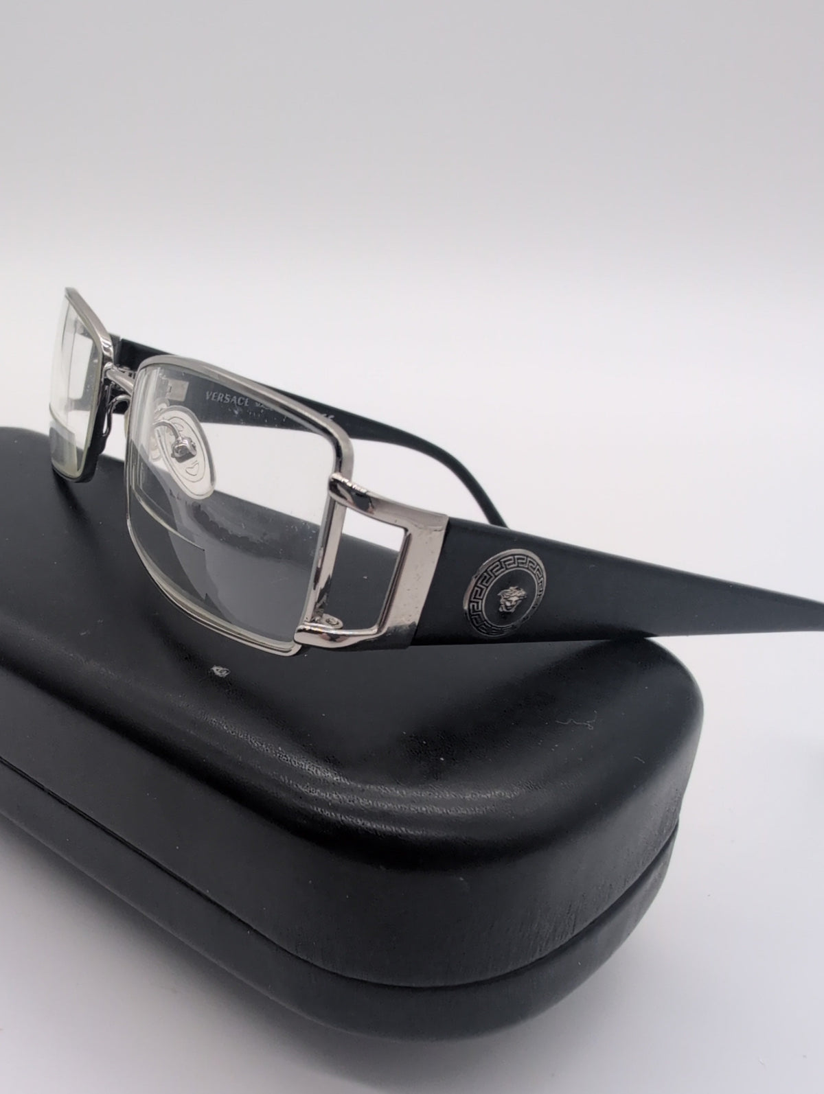 Vintage Versace, Model VE1163M, Silver Metal Frames Featuring Black Temple Arm with Iconic Silver Medusa Logo. Bifocal lenses with Unknown Prescription.