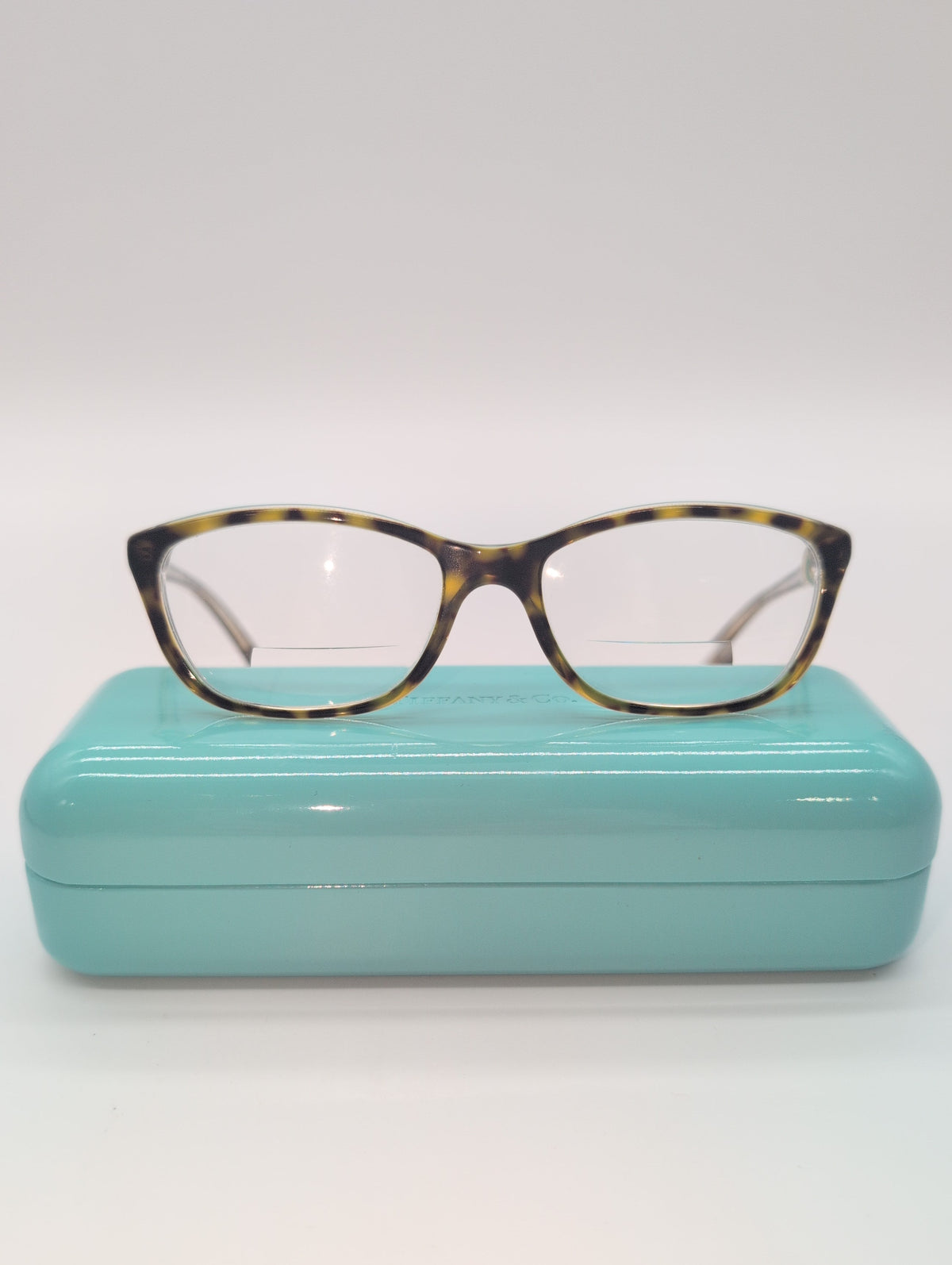 Tiffany and Co. Model TF2074 8155, Blonde Havana/Gold Tortoise Shell Reading Glasses with Case. Bifocal Lenses with Unknown Prescription.