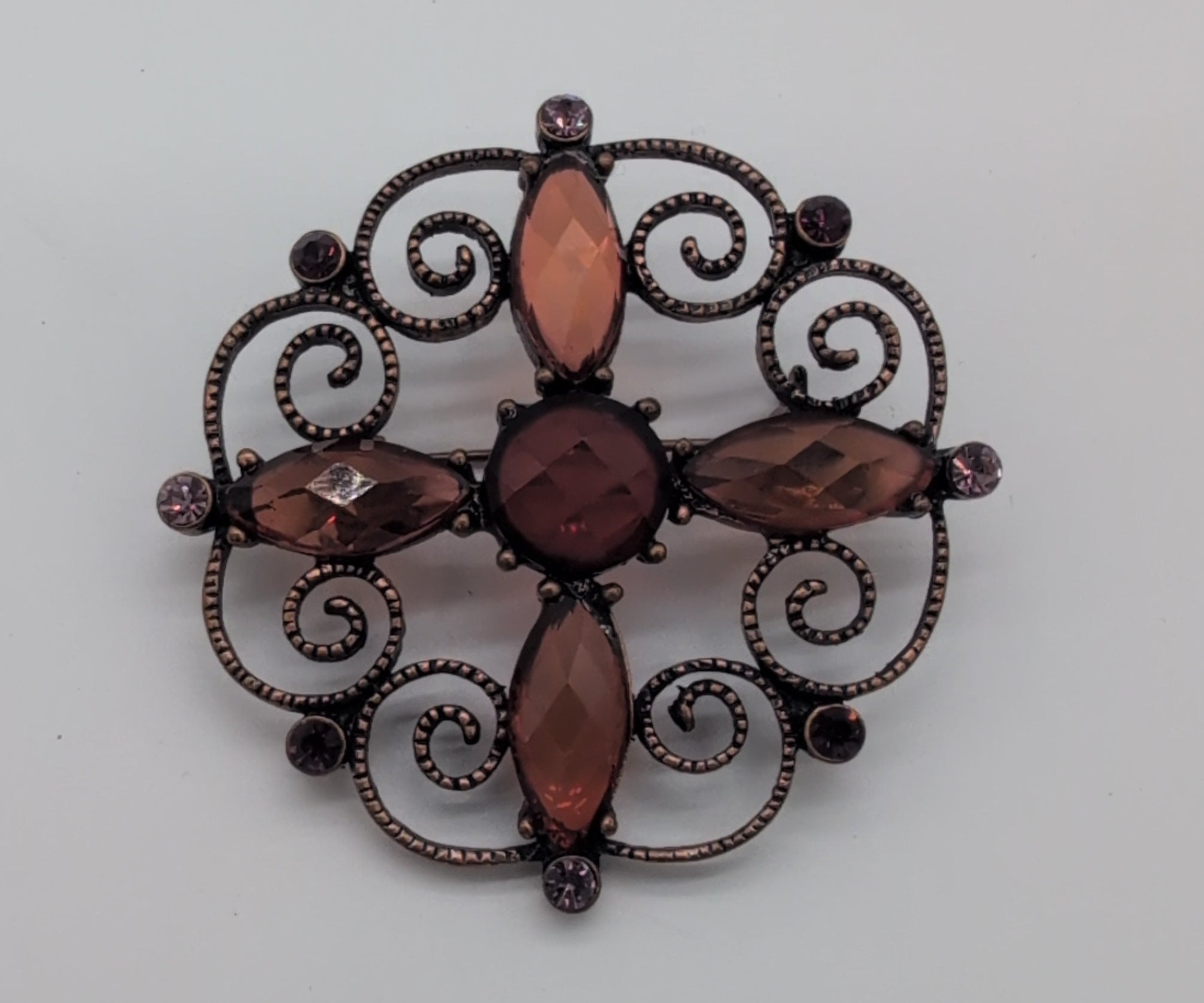 Bronze Toned Pin with Opaque Brown and Purple Rhinestones